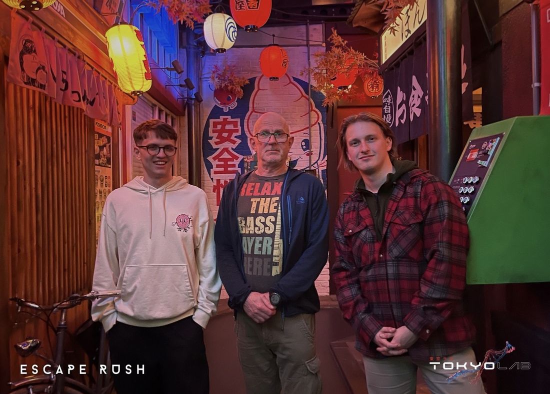 Viktor and teammates in a Tokyo-themed escape room